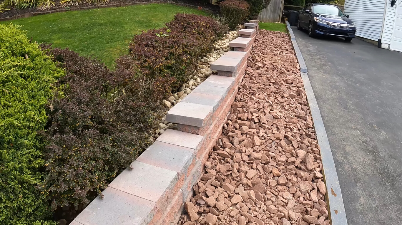 Retaining wall and concrete masonry